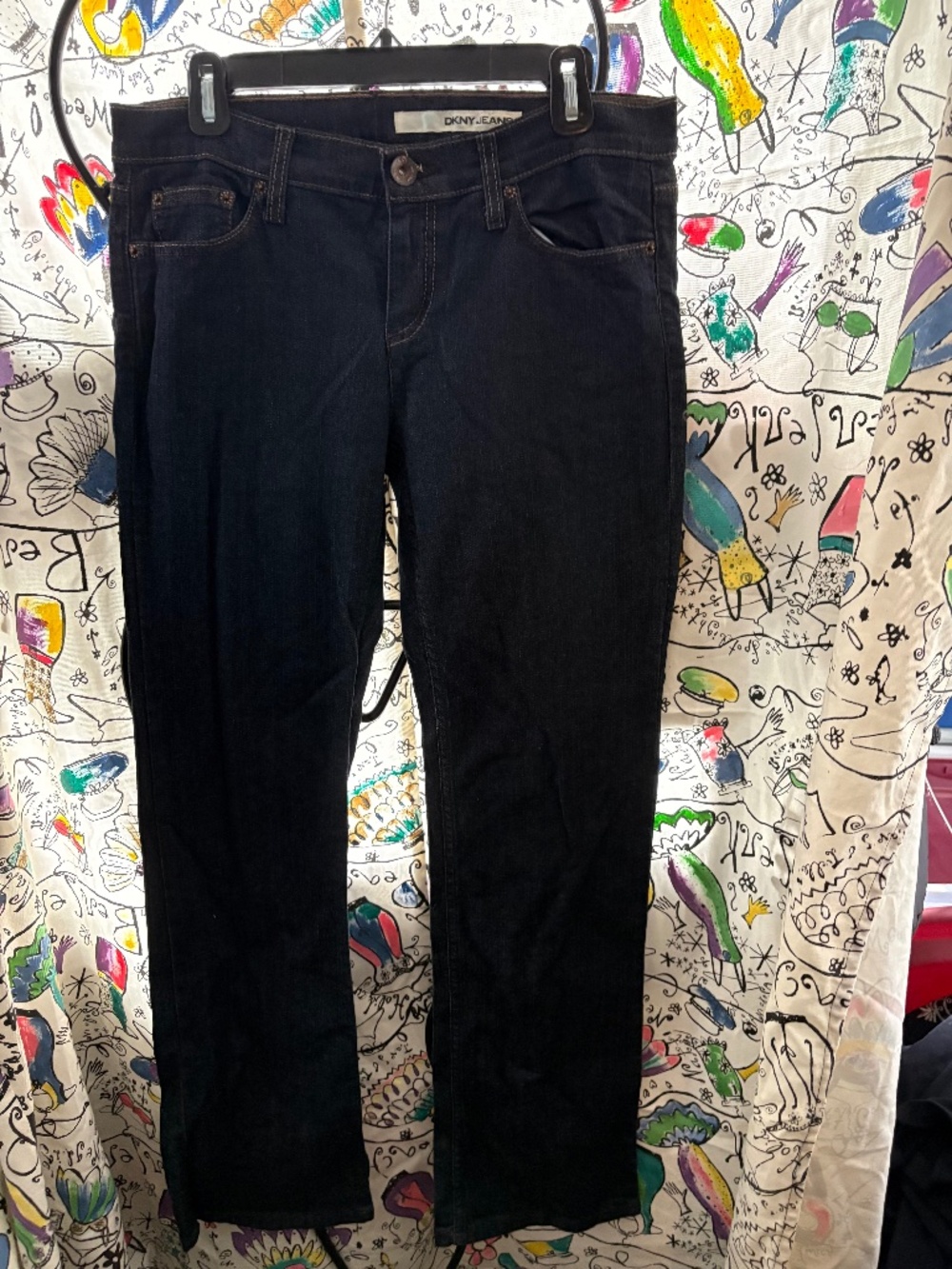 DKNY 4 pocket dark denim with a low rise and bootcut